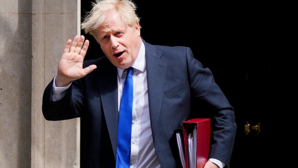British Prime Minister Boris Johnson gestures as he leaves 10 Downing Street in London, Wednesday, July 6, 2022. A defiant British Prime Minister Boris Johnson is battling to stay in power after his government was rocked by the resignation of two top