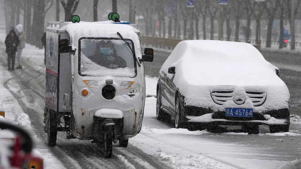 Early-season snow blankets Beijing and northern China