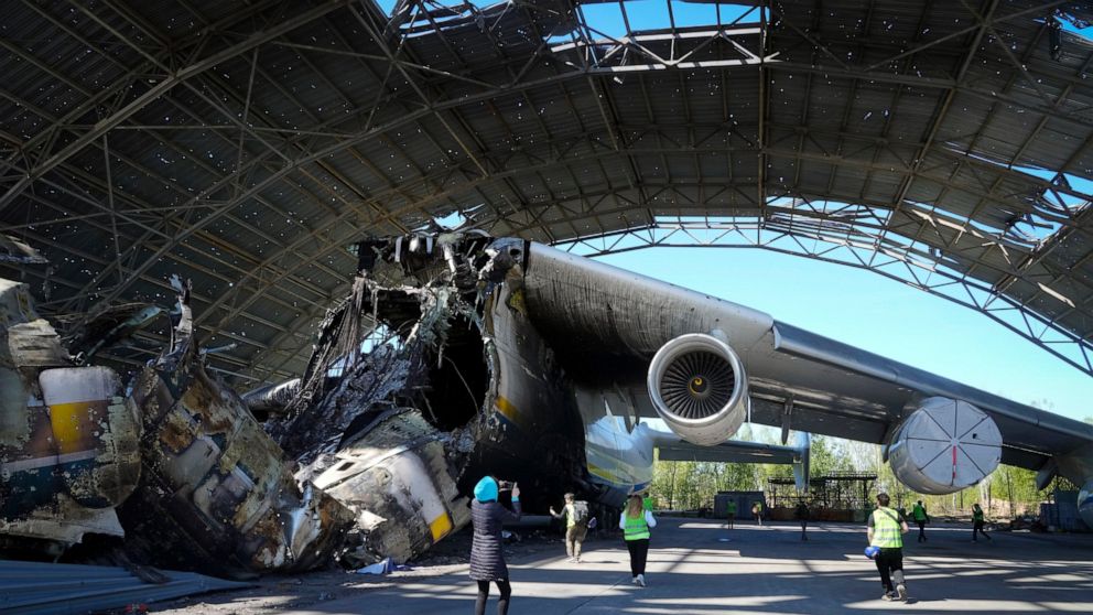 The gutted remains of the Antonov An-225, world's biggest cargo aircraft destroyed during recent fighting between Russian and Ukrainian forces, at the Antonov airport in Hostomel, on the outskirts of Kyiv, Ukraine, Thursday, May 5, 2022. (AP Photo/Ef