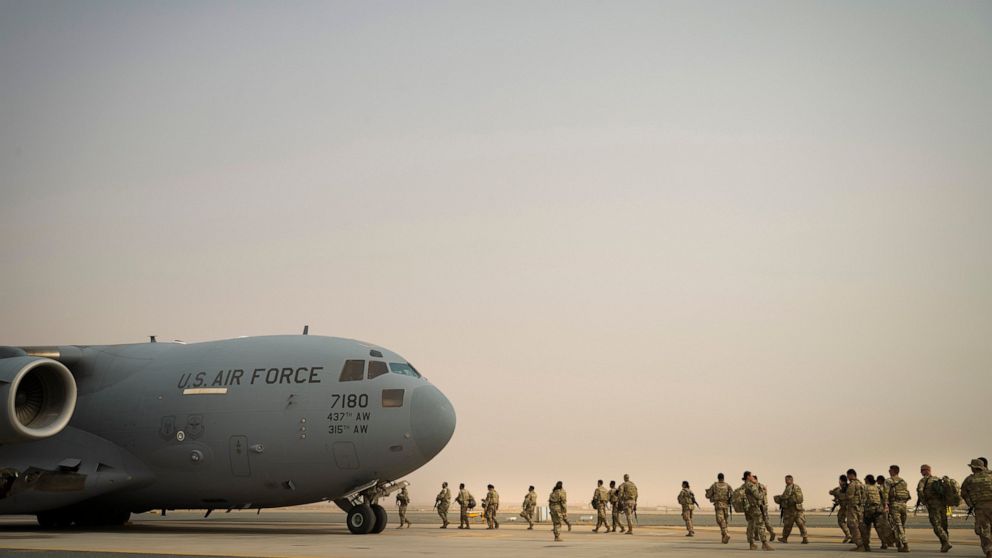 This image taken by the U.S. Air Force shows U.S. Army troops from the 1st Combined Arms Battalion, 163rd Cavalry Regiment, board a C-17 Globemaster III during an exercise at Ali Al Salem Air Base, Kuwait, Aug. 10, 2022. The U.S. Air Force said Satur