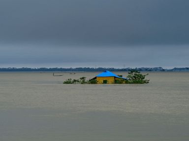 AP PHOTOS: India, Bangladesh floods destroy homes, lives