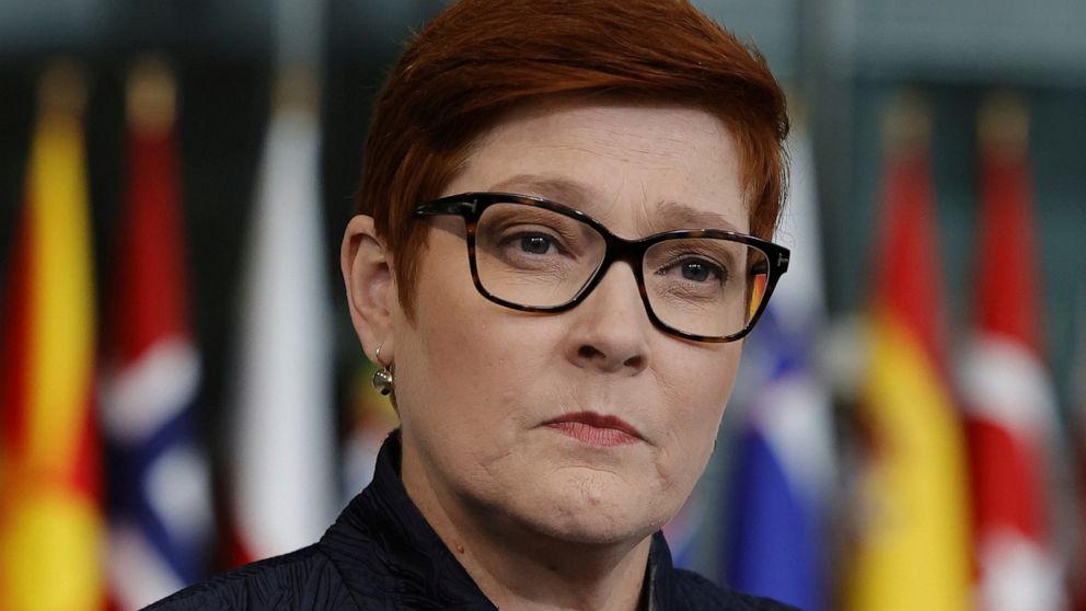 FILE - Australian Foreign Minister Marise Payne speaks with the media as she arrives for a meeting of NATO foreign ministers at NATO headquarters in Brussels on April 7, 2022. Payne said on Saturday, May 7, 2022 she met the Solomon Islands' Developme