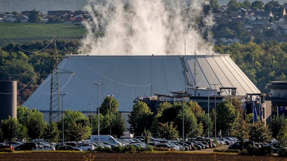 FILE - Smoke rises from the nuclear power plant of Nerckarwestheim in Neckarwestheim, Germany, on Aug. 22, 2022. Europe is staring an energy crisis in the face. The cause: Russia throttling back supplies of natural gas. European officials say it's a 