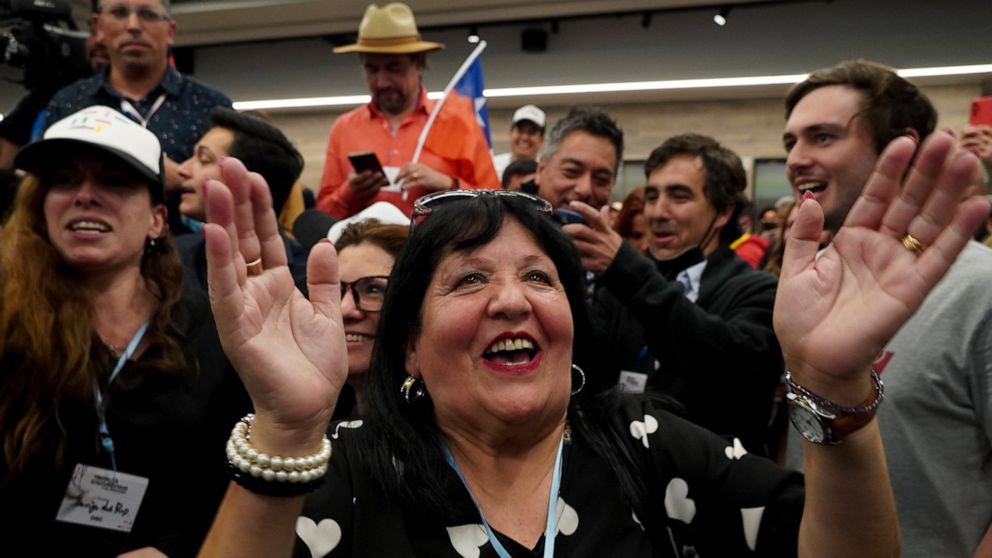 Opponents of the new Constitution cheer as they listen to the partial results of a plebiscite on whether the new Constitution will replace the current Magna Carta imposed by a military dictatorship 41 years ago, in Santiago, Chile, Sunday, Sept. 4, 2
