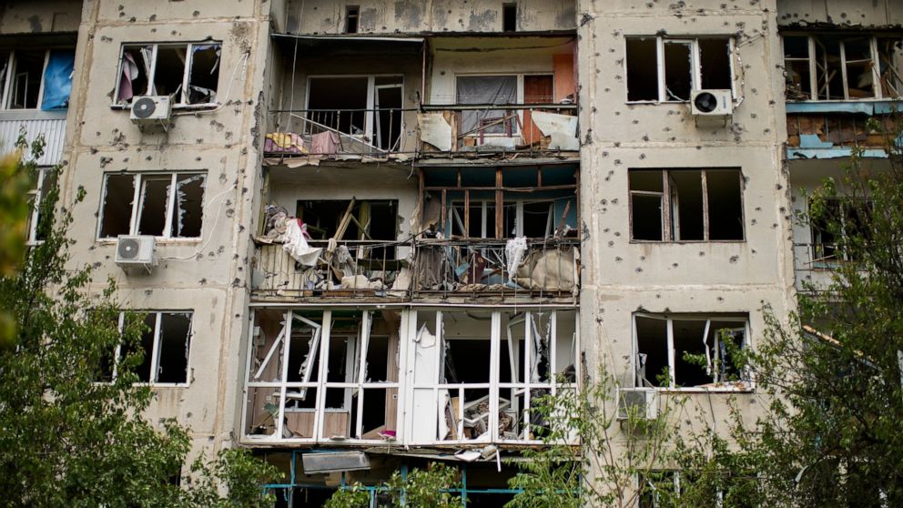 View of an apartment building damaged in an overnight missile strike, in Sloviansk, Ukraine, Tuesday, May 31, 2022. (AP Photo/Francisco Seco)