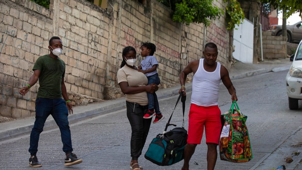 Back in Haiti, expelled migrant family plans to flee again