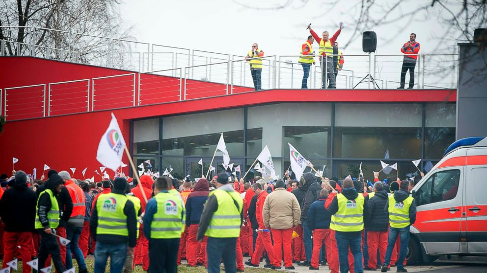 Employees of the Gyor plant of German car maker Audi AG hold a two-hour warning strike organised by the Audi Hungaria Independent Union (AHFSZ) in Gyor, 120 kms west of Budapest, Hungary, Friday, Jan. 18, 2019. The union demands a wage increase of at