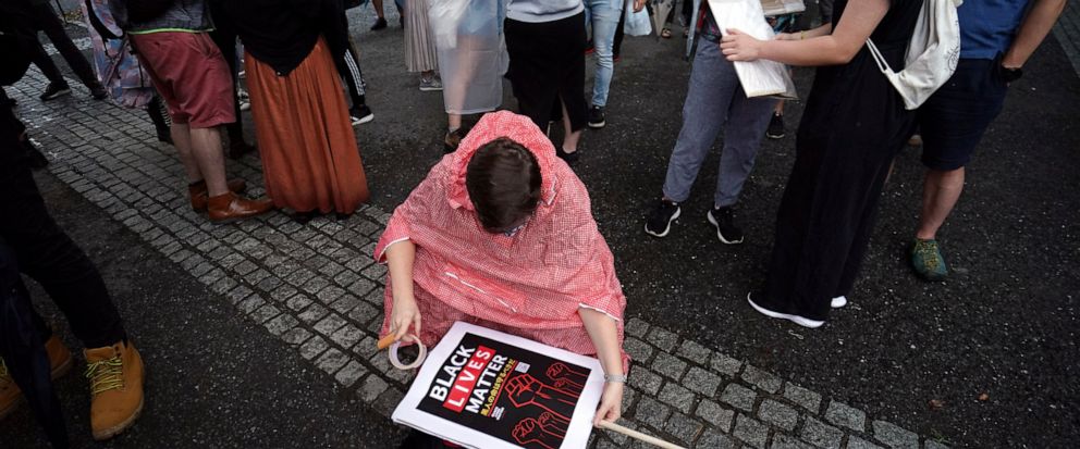 Japan, New Zealand march to mourn George Floyd, seek change - ABC News