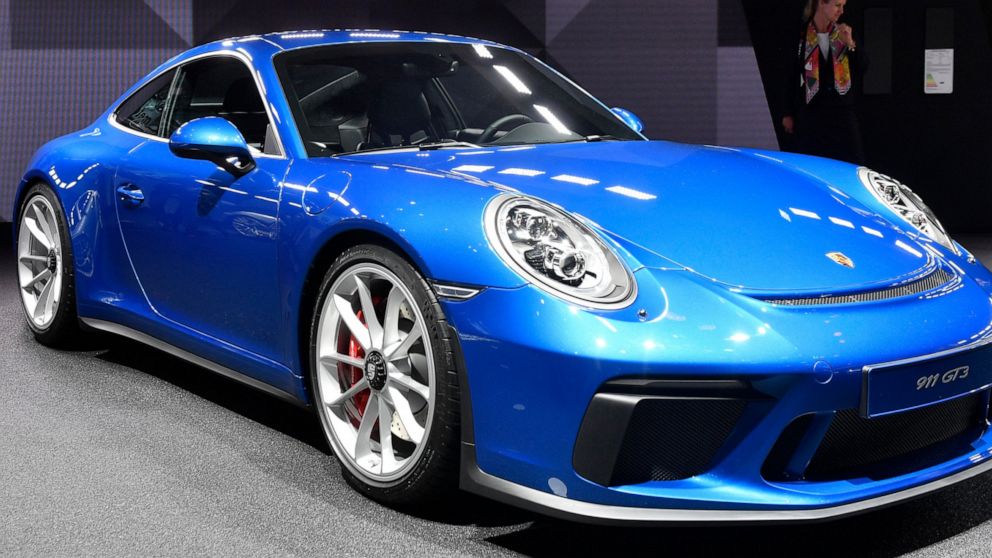 FILE --A Porsche 911 GT3 with Touring Package is on display during an event of German car maker Volkswagen on the eve of the opening of the International Frankfurt Motor Show IAA in Frankfurt, Germany, Monday, Sept. 11, 2017, which runs through Sept.