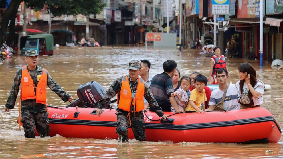 China sees record rains, heat as weather turns volatile