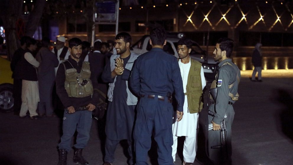 Suicide truck bomber hits Afghan guest house, killing 21
