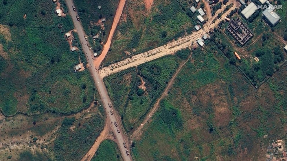 FILE - This satellite image provided by Maxar Technologies is said by them to show unidentified military forces mobilized in the town of Sheraro, in the Tigray region of northern Ethiopia on Sept. 26, 2022. Roughly 40 girls and women between the ages