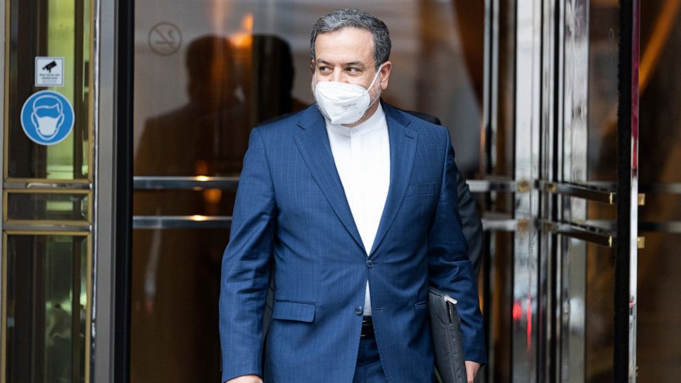 Political deputy at the Ministry of Foreign Affairs of Iran, Abbas Araghchi leaves the 'Grand Hotel Vienna' where closed-door nuclear talks take place in Vienna, Austria, Saturday, June 12, 2021. (AP Photo/Florian Schroetter)