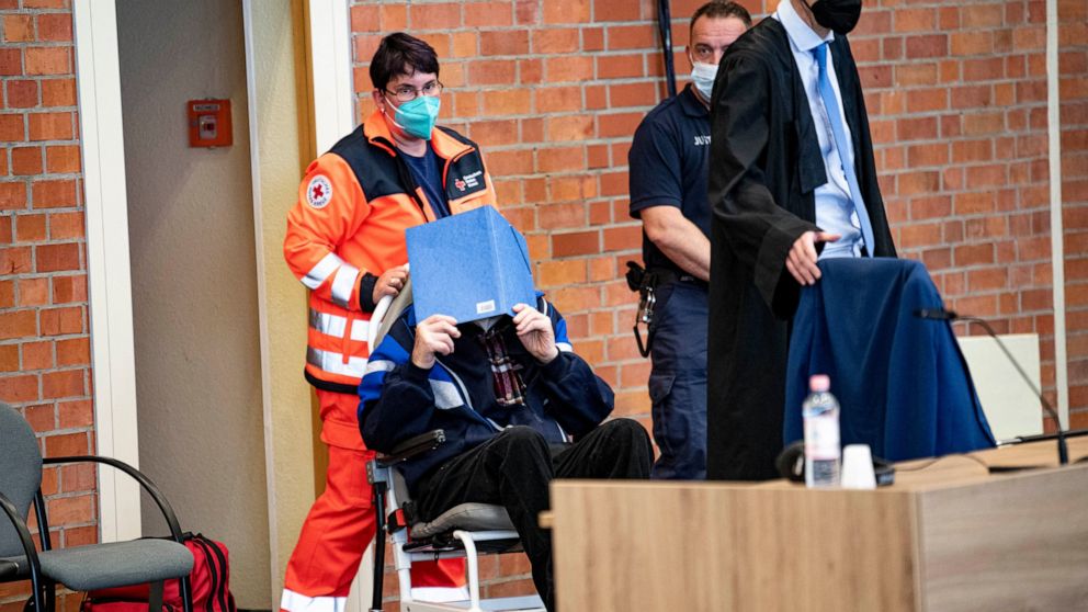 File---File photo shows the defendant coming to the continuation of the trial of the Neuruppin Regional Court, May 16, 2022. According to the indictment, the former concentration camp guard, who is now 101 years old, knowingly and willingly assisted 