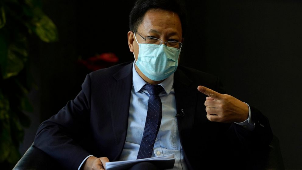 Xu Guixiang, the deputy director-general of the Xinjiang Communist Party publicity department, speaks during an interview in Beijing Monday, Dec. 21, 2020. The Chinese Communist Party official signaled Monday that there would likely be no let-up in i