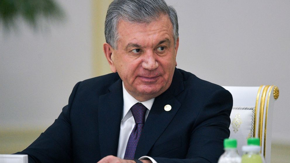 FILE - In this file Friday, Oct. 11, 2019 file photo, Uzbekistan's President Shavkat Mirziyoyev attends the meeting of the heads of CIS states in Ashgabat, Turkmenistan. Uzbekistan's president is expected to win a new term by a landslide against weak