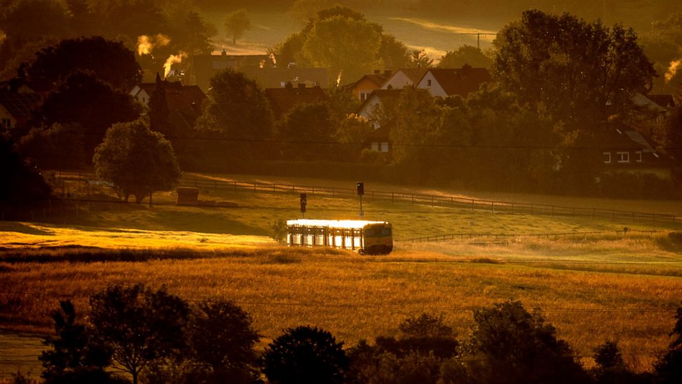 A regional train approaches the city of Wehrheim near Frankfurt, Germany, Wednesday, June 1, 2022. From Wednesday, people in Germany can use a 9-euro ticket for public transport which is valid for a whole month. (AP Photo/Michael Probst)