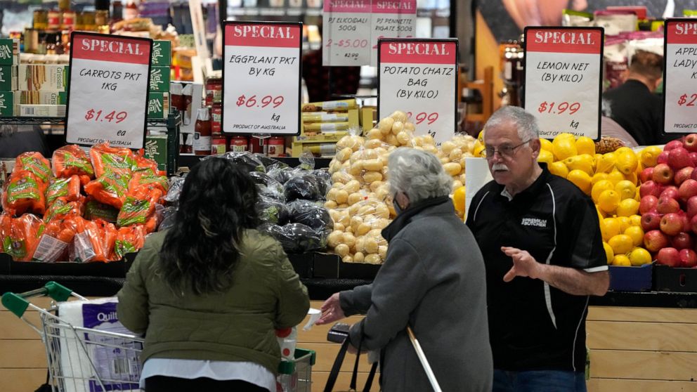 Shoppers look at produce at a shopping center in Sydney on Wednesday, July 27, 2022. Inflation in the year through June was 6.1%, up from 5.1% in the year through March, the Australian Bureau of Statistics said. (AP Photo/Rick Rycroft)