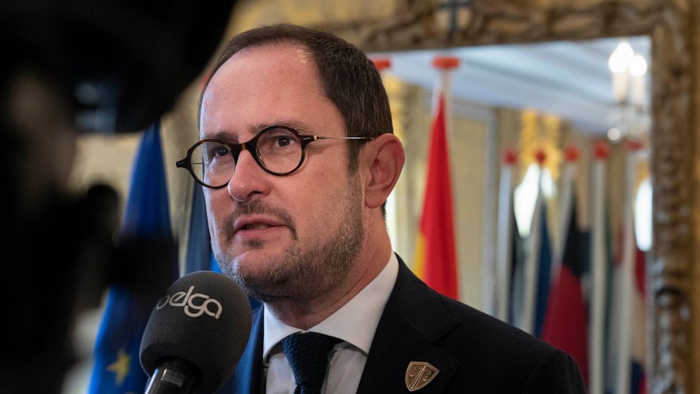 Belgium's Justice Minister Vincent Van Quickenborne is interviewed in Amsterdam, Netherlands, Friday, Oct. 7, 2022, after ministers and delegates from six European nations met to discuss ways of stepping up the fight against organized crime that they