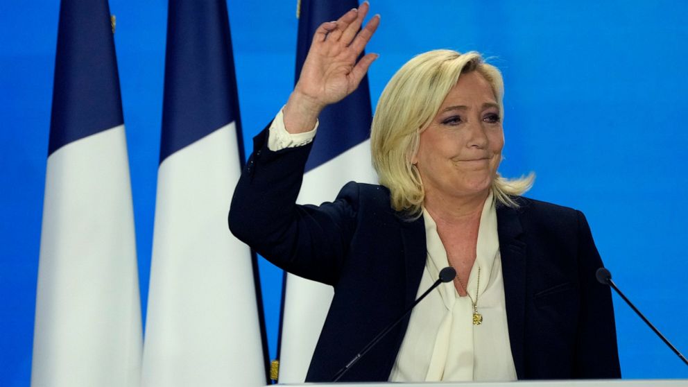 Far-right leader Marine Le Pen speaks after the early result projections of the French presidential election runoff were announced in Paris, Sunday, April 24, 2022. French polling agencies are projecting that centrist incumbent Emmanuel Macron will w