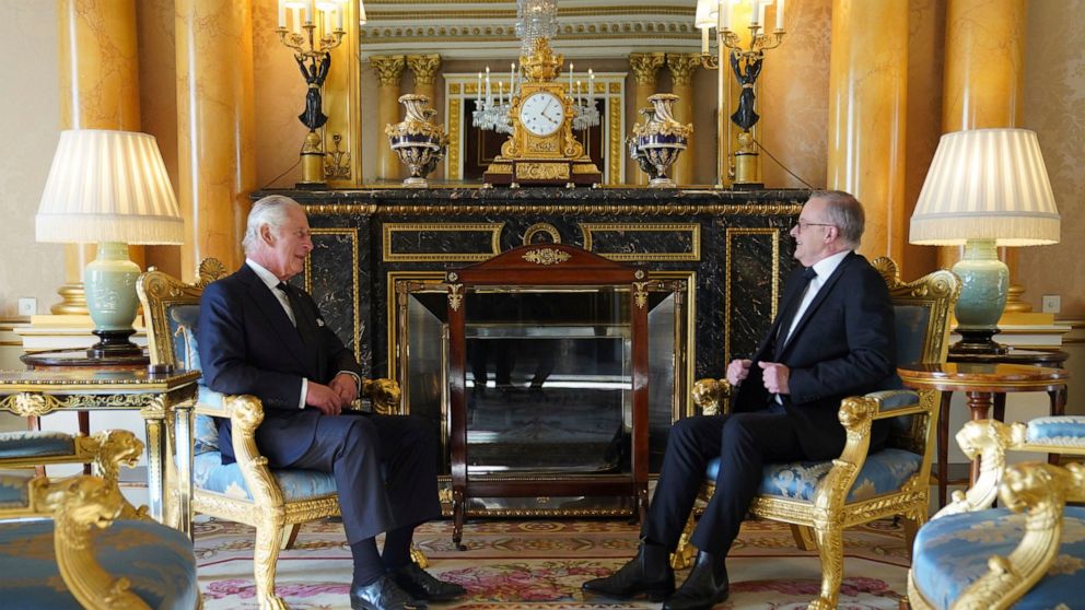 Britain's King Charles III sits with Prime Minister of Australia Anthony Albanese, as he receives realm prime ministers in the 1844 Room at Buckingham Palace in London, Saturday, Sept. 17, 2022. (Stefan Rousseau/Pool via AP)