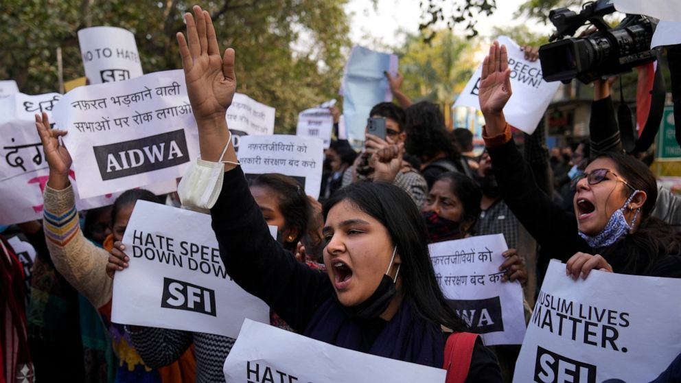 FILE- Activists of various left organizations shout slogans during a protest against hate speech in New Delhi, India, Dec.27, 2021. Indian police have opened a case and begun investigating a Hindu monk for making highly provocative speeches against M