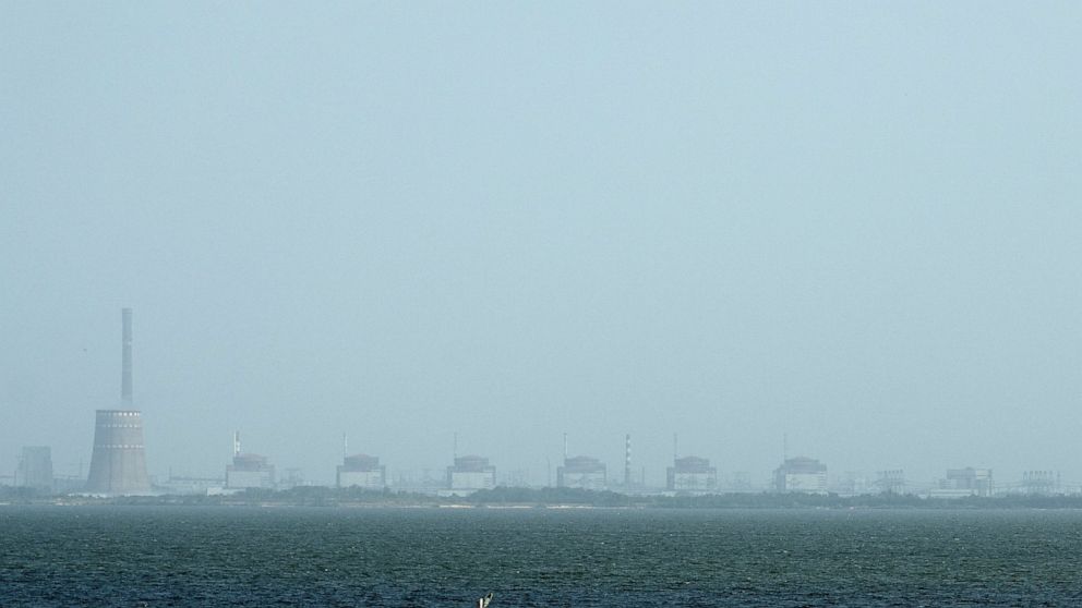 FILE - A view of the Zaporizhzhya nuclear plant and the Dnipro river on the other side of Nikopol, Ukraine on Aug, 22, 2022. (AP Photo/Evgeniy Maloletka, File)