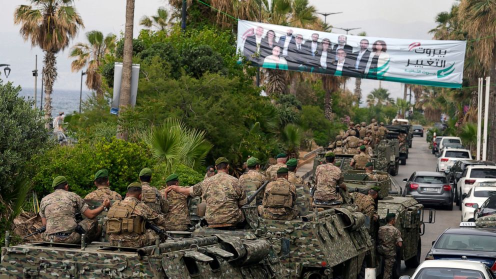 Mired in crises, Lebanese begin voting for new parliament