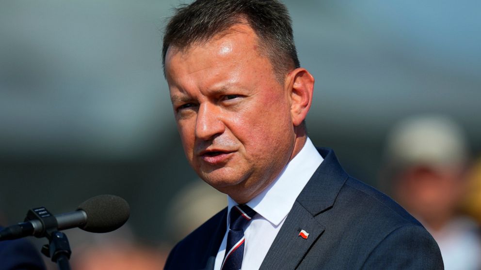 FILE - Defense Minister of Poland Mariusz Blaszczak answers questions to media after signing an air policing treaty at an airshow in Malacky, Slovakia, Aug. 27, 2022. Blaszczak on Tuesday, Dec. 6 says his country will accept a Patriot missile defense
