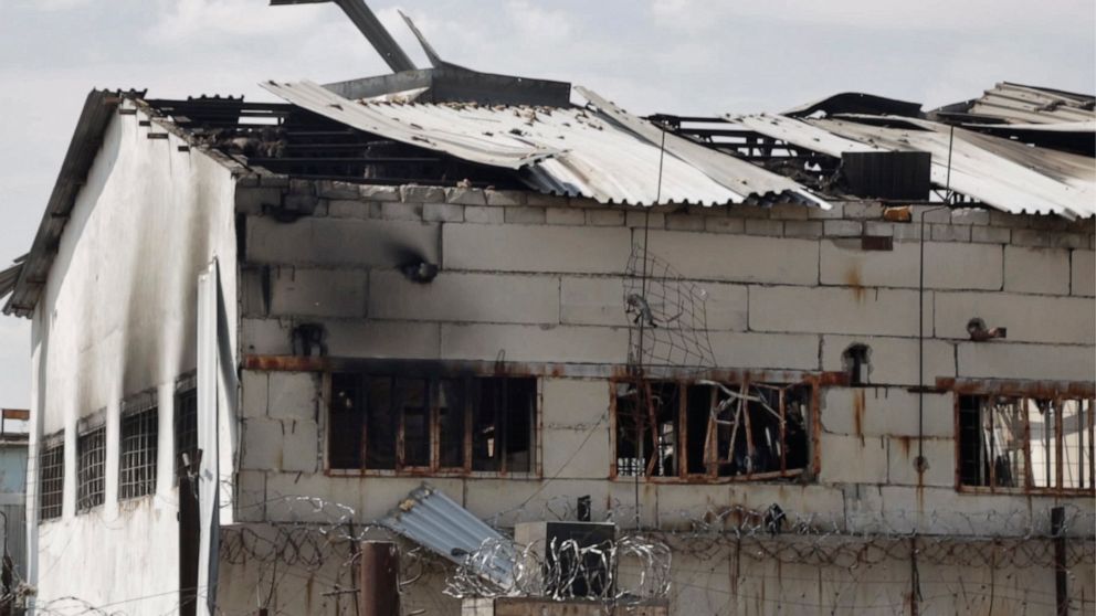 In this photo taken from video a view of a destroyed barrack at a prison in Olenivka, in an area controlled by Russian-backed separatist forces, eastern Ukraine, Friday, July 29, 2022. Russia and Ukraine accused each other Friday of shelling a prison