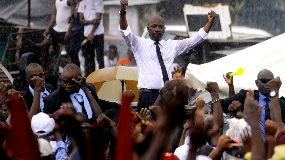 Ivory Coast's former youth minister Charles Ble Goude is cheered by supporters upon his return to Abidjan, Ivory Coast, Saturday Nov. 26, 2022, after more than a decade in exile. Ble Goude was acquitted of charges linked to the violence that erupted 