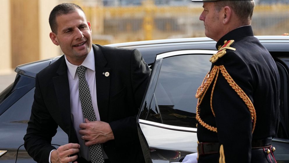 FILE - Malta's Prime minister Robert Abela arrives at the Chateau de Versailles to attend the second day of the EU summit, Friday, March 11, 2022 in Versailles, west of Paris. Abela on Sunday, March 27, 2022 was claiming victory in his nation’s parli