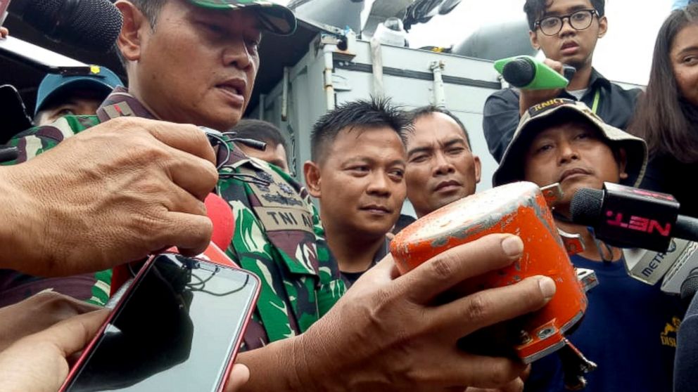 Indonesian Navy Commander Rear Admiral Yudo Margin shows the recovered cockpit voice recorder of Lion Air flight 610 that crashed into the sea in October during a press conference on board of the navy ship KRI Spica in the waters off Tanjung Karawang, Indonesia, Monday, Jan. 14, 2019. Navy divers have recovered the cockpit voice recorder in a possible boost to the accident investigation. (AP Photo/Achmad Ibrahim)