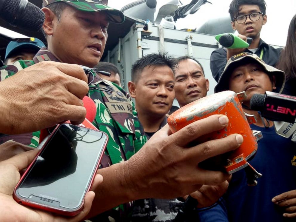 Indonesian Navy Commander Rear Admiral Yudo Margin shows the recovered cockpit voice recorder of Lion Air flight 610 that crashed into the sea in October during a press conference on board of the navy ship KRI Spica in the waters off Tanjung Karawang