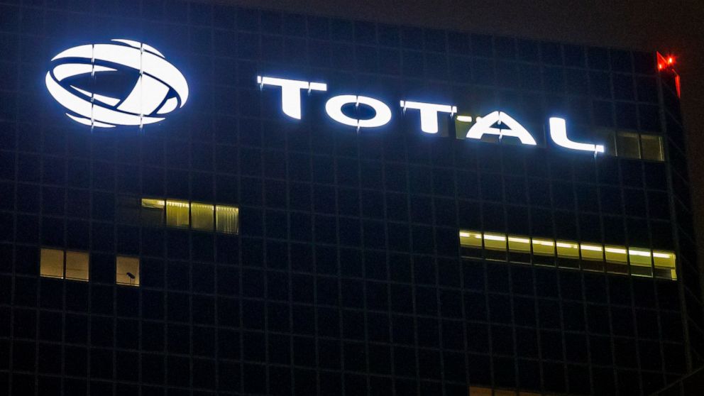 FILE - In this Oct. 12, 2016, file photo, the logo of French oil giant Total SA is pictured at company headquarters in La Defense business district, outside Paris. French energy giant Total signed mega contracts with Iraq worth $27 billion to develop