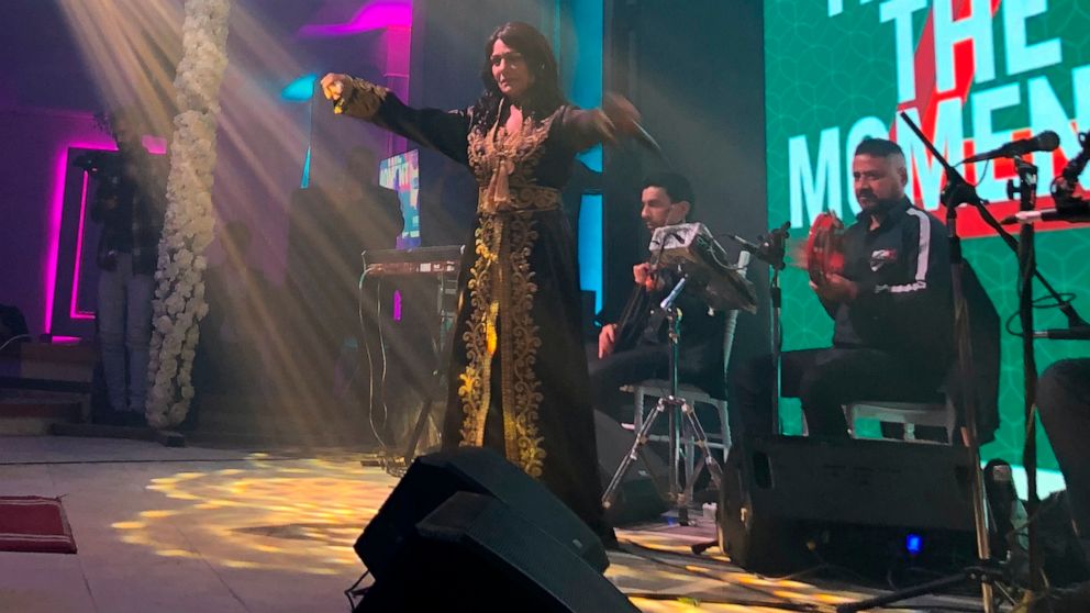 Iraqi singer Sajda Obeid gives a concert at the "Yarmouk Club" in Baghdad, Iraq, Monday, Dec. 13, 2021. Obeid is a unifying figure in Iraq's fractured society. For older Iraqis, the 63-year old is a symbol of a bygone golden era. To the young, her up