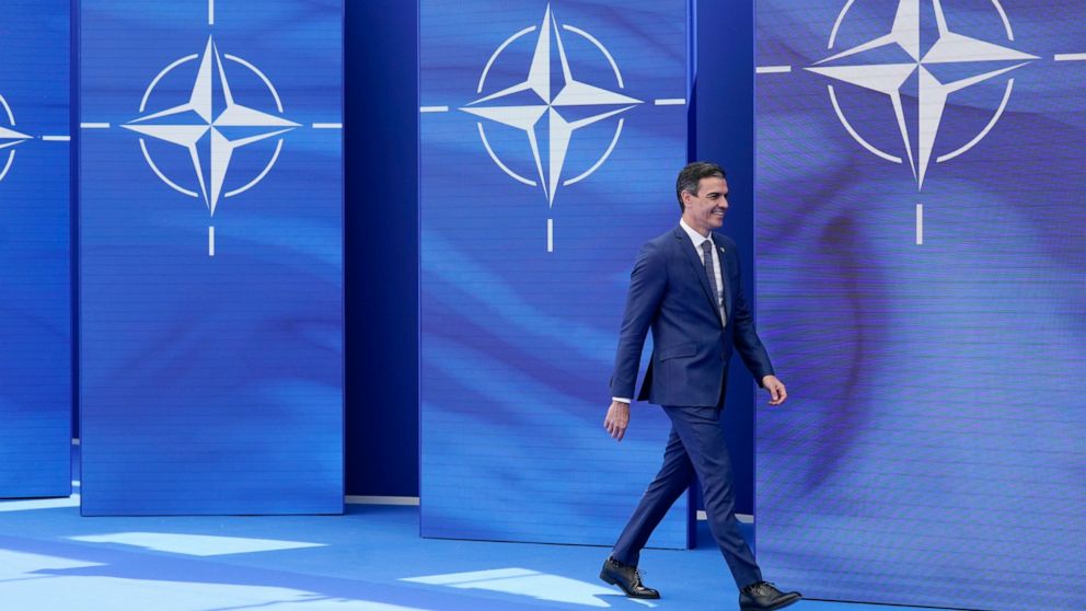 Spain's Prime Minister Pedro Sanchez arrives to pose for photos with NATO Secretary General Jens Stoltenberg at the NATO summit at NATO headquarters in Brussels, Monday, June 14, 2021. Russia’s invasion of Ukraine is certain to dominate an upcoming N