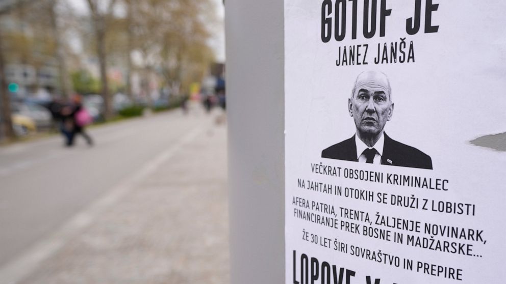 Slovenians vote in tight race between populists, liberals