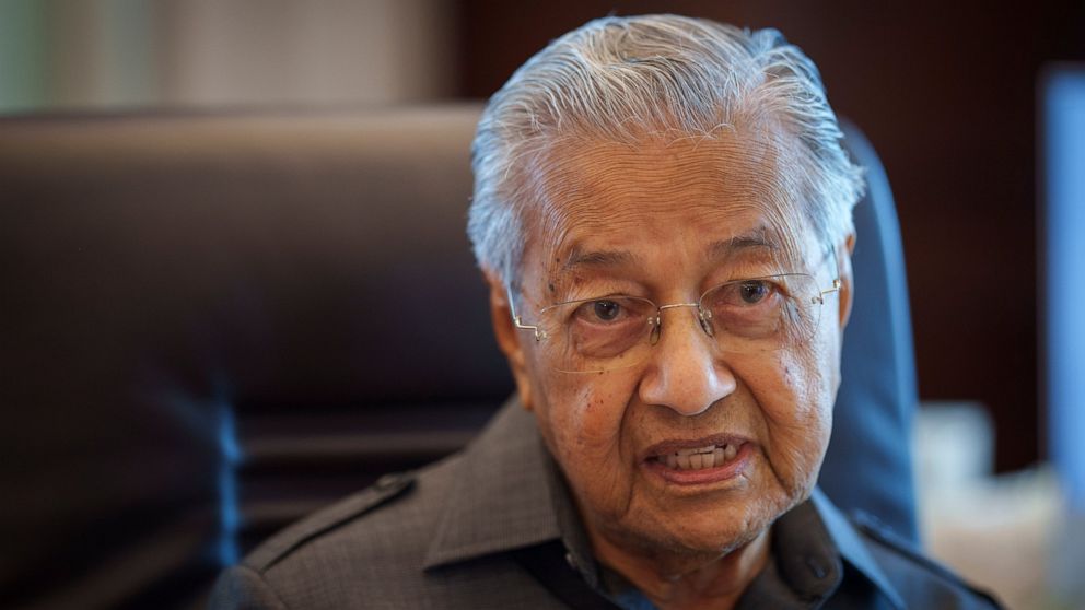Malaysia's former Prime Minister Mahathir Mohamad speaks during an interview with The Associated Press at his office in Kuala Lumpur, Malaysia, Friday, Aug. 19, 2022. Mahathir expects Malaysia’s graft-tainted ruling party will hold general elections 