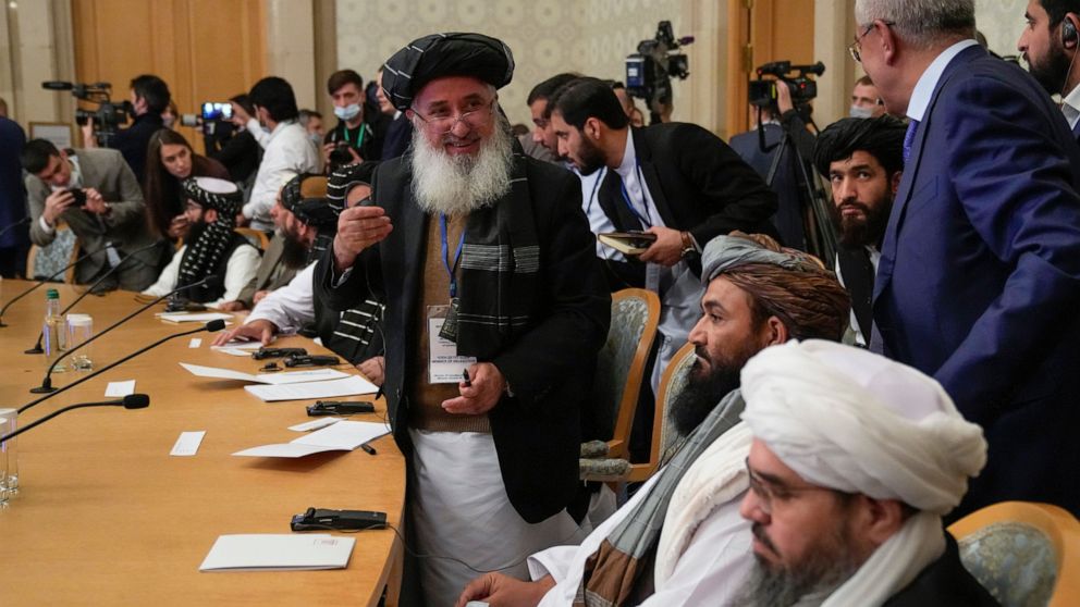 Members of the political delegation from the Afghan Taliban's movement attend talks involving Afghan representatives in Moscow, Russia, Wednesday, Oct. 20, 2021. Russia invited the Taliban and other Afghan parties for talks voicing hope they will hel