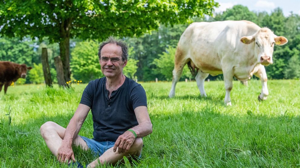 Backed by Greenpeace, farmer sues VW over climate change
