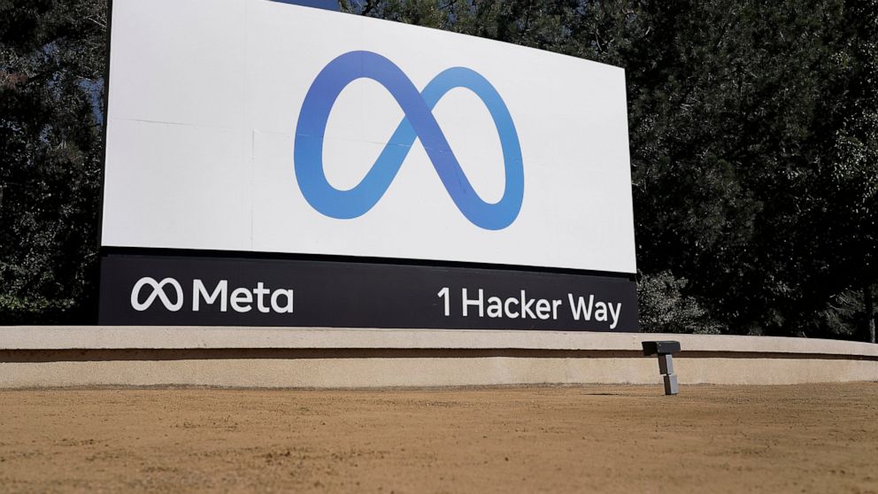 FILE - Facebook's Meta logo sign is seen at the company headquarters in Menlo Park, Calif., on, Oct. 28, 2021. A Moscow court has banned Facebook and Instagram for what it deemed extremist activity in a case against Meta, the company which owns the s