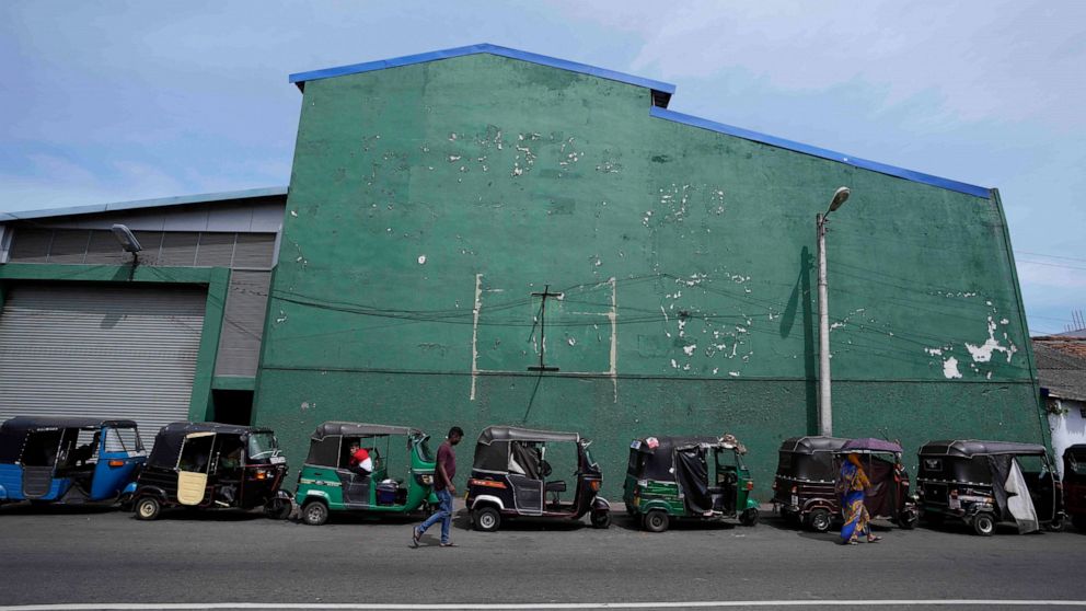 Auto rickshaws queue up outside a fuels station amid fuel shortage in Colombo, Sri Lanka, Tuesday, July 5, 2022. Sri Lanka's ongoing negotiations with the International Monetary Fund have been complex and difficult than the instances before because i