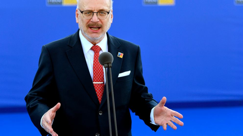 FILE - Latvia's President Egils Levits arrives for the NATO summit in Madrid, June 29, 2022. Latvia’s president said Tuesday, July 12, 2022 that he supports a plan to reinstate national conscription for men, and for women on a voluntary basis. The dr