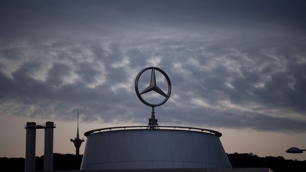 The Mercedes star is pictured at the Mercedes Benz headquarters in Stuttgart, Germany, Wednesday, July 8, 2020. Due to the Corona pandemic, the annual general meeting of the car manufacturer Daimler takes place only online. (Marijan Murat/dpa via AP)