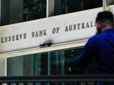 Australian central bank decides first rate hike in 11 years thumbnail