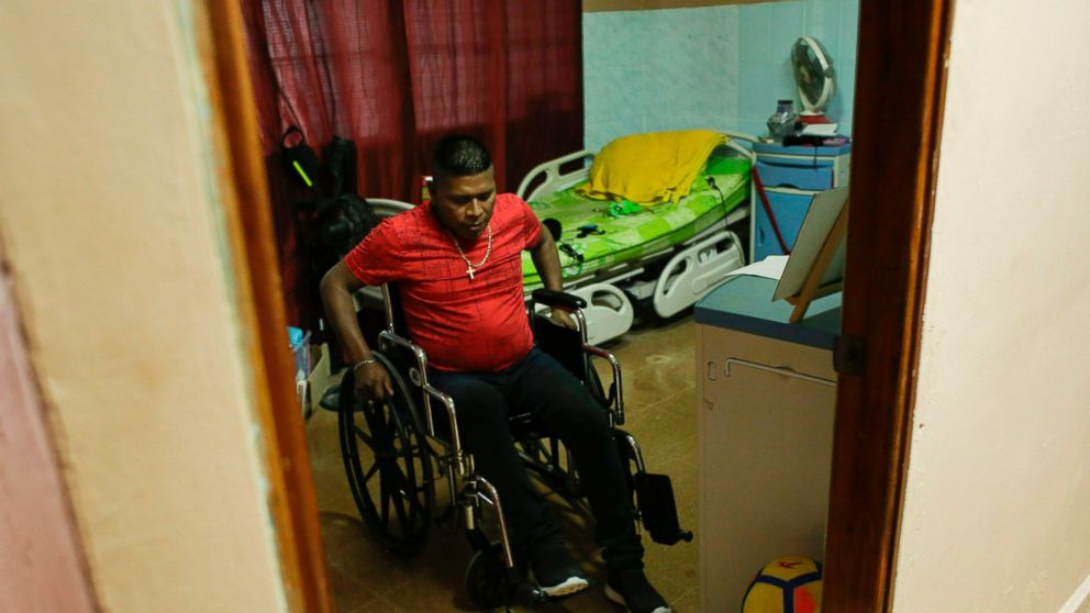 Raul Tubri leaves his room at the Good Samaritan home, a Roman Catholic-run shelter for HIV and AIDS patients, in Panama City, Saturday, Jan. 19, 2019. Like many others from his poor, indigenous region of Panama, Tugri left for the capital years ago 