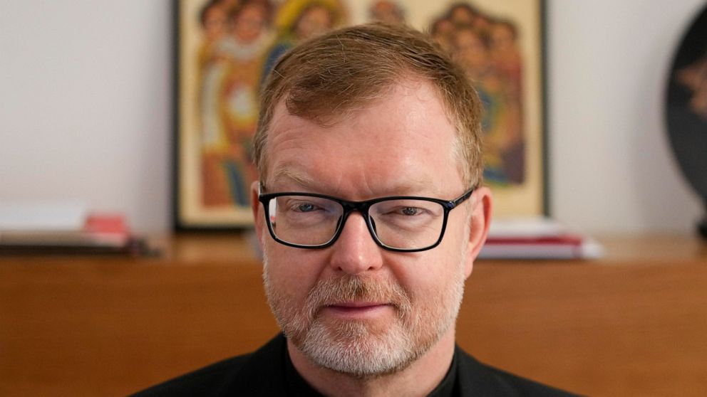 Hans Zollner, head of the new safeguarding institute at the Pontifical Gregorian University, poses for photos before an interview with the Associated Press, in Rome, Wednesday, Oct. 13, 2021. The Catholic Church’s foremost research and training insti