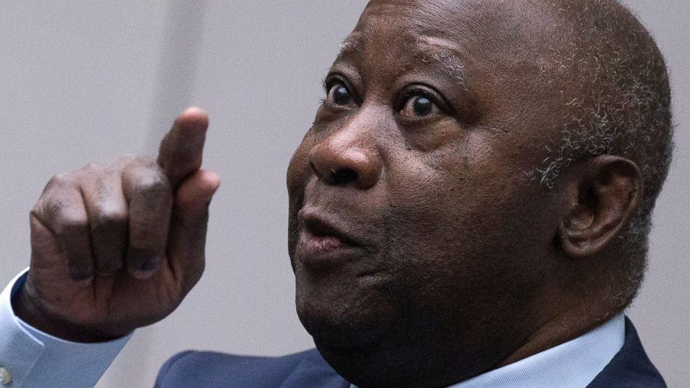 Former Ivory Coast President Laurent Gbagbo enters the courtroom of the International Criminal Court in The Hague, Netherlands, Tuesday, Jan. 15, 2019, where judges acquitted Gbagbo and ex-government minister Charles Ble Goude of crimes committed dur