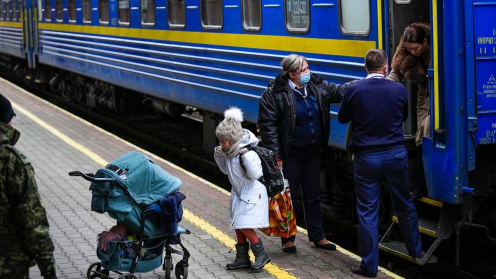 Ukrainians flee war, seeking safety across western borders